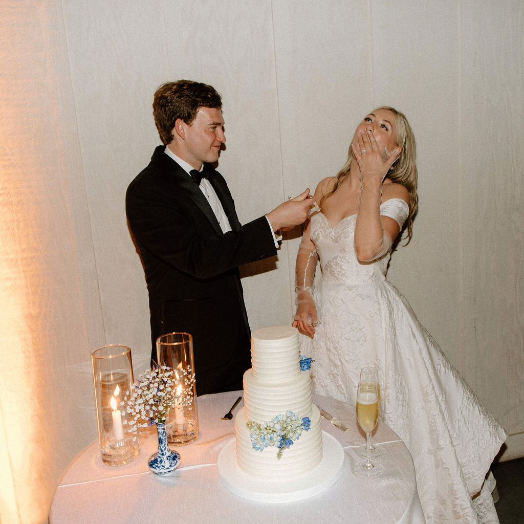 bride and groom cutting cake during sonoma wedding day