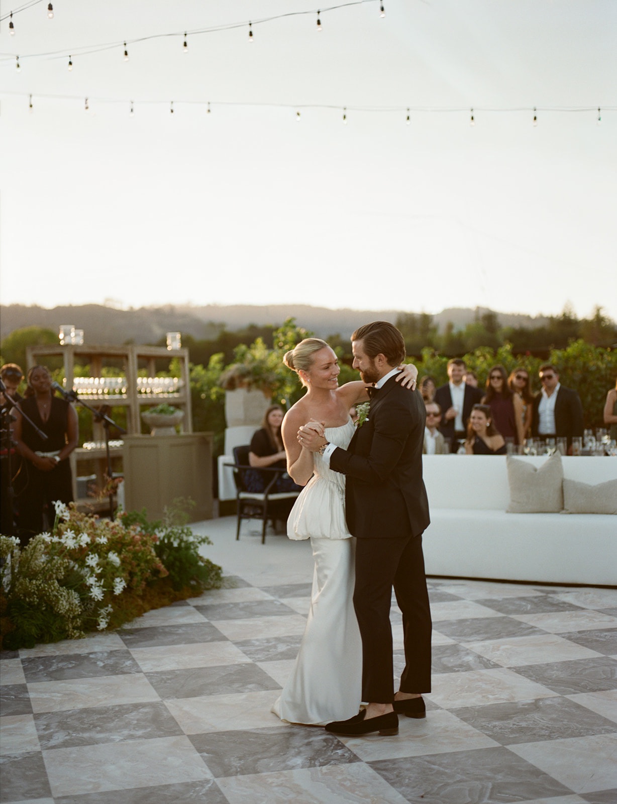 Couple has first dance at their modern wedding reception